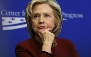 Clinton listens to remarks as she takes part in a Center for American Progress roundtable discussion on "Expanding Opportunities in America's Urban Areas" in Washington